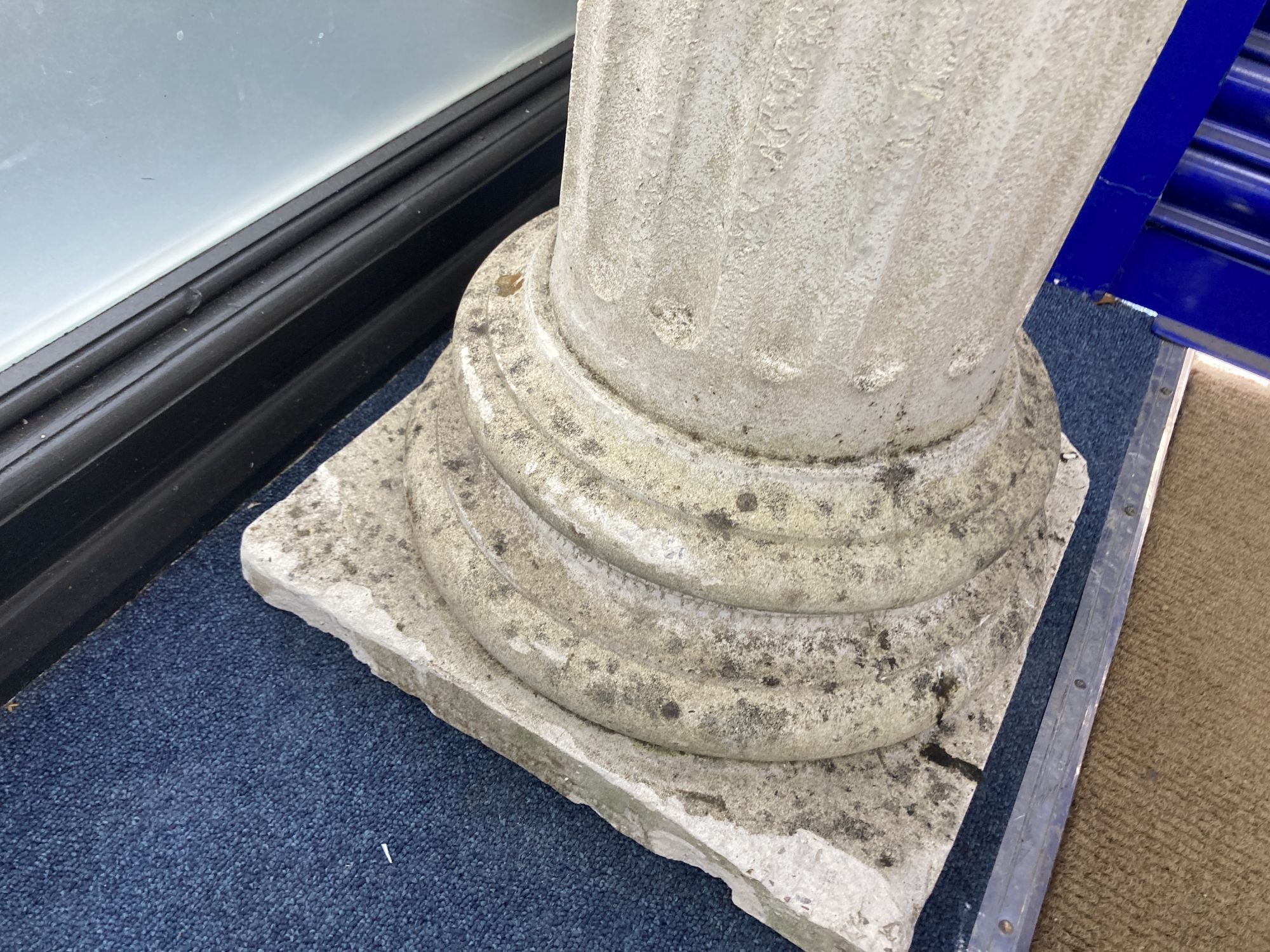 A reconstituted stone ionic garden pedestal, width 39cm, height 104cm